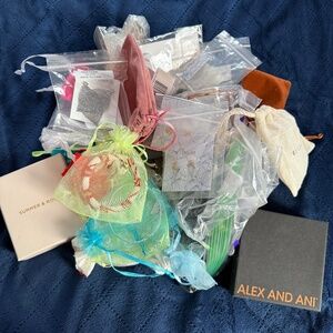 50-piece mystery box of jewelry: earrings, necklaces, bracelets, & pins